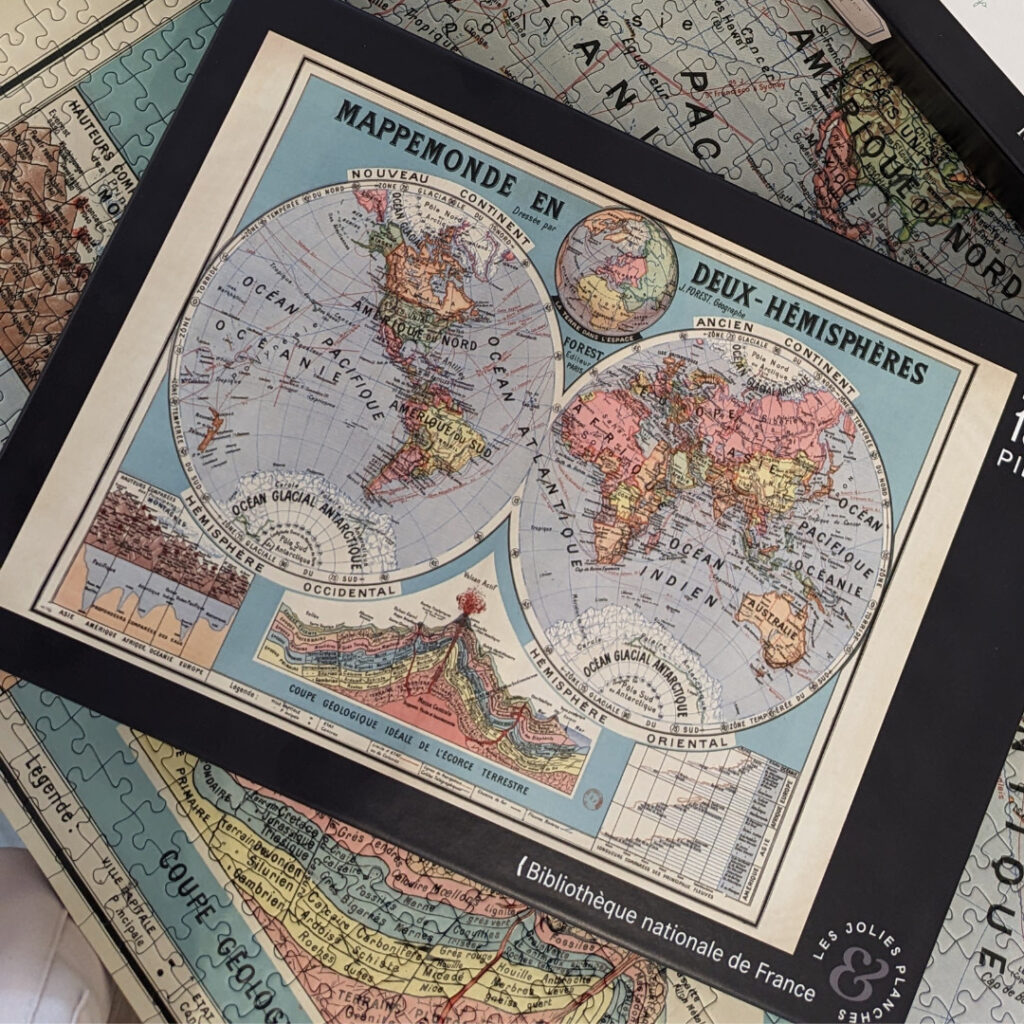 Puzzle 1500 pièces carte du monde, boite et puzzle